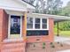Close-up of the house entrance showing the updated front door and brick work detail and window design at 105 Dandridge Rd, Walterboro, SC 29488