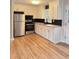 Updated kitchen has white cabinets, stainless steel appliances and butcher block countertops at 105 Dandridge Rd, Walterboro, SC 29488
