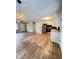 Spacious living room and kitchen area featuring hardwood floors and modern lighting at 105 Dandridge Rd, Walterboro, SC 29488