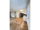 Spacious living room and kitchen area featuring hardwood floors and modern lighting at 105 Dandridge Rd, Walterboro, SC 29488