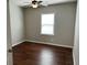 Cozy bedroom with hardwood floors, natural light, and neutral paint at 107 Brookhaven Rd, Summerville, SC 29486