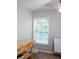 Bright room with a window letting in natural light, plus a light wood workbench with a plush dog bed at 107 Twin Tree Dr, Summerville, SC 29485