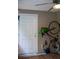 Garage with a bicycle storage, a blue watering can, wood floors, and door to the backyard at 107 Twin Tree Dr, Summerville, SC 29485