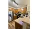 Efficient kitchen featuring stainless steel appliances, wooden cabinetry, and a convenient breakfast bar at 107 Twin Tree Dr, Summerville, SC 29485