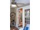 Screened-in porch with a ceiling fan, bicycle storage, and view into the bathroom at 107 Twin Tree Dr, Summerville, SC 29485