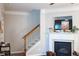 Elegant staircase with white railings that provide access to the upper level of the home at 107 Twin Tree Dr, Summerville, SC 29485