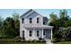 Charming two-story home with light-blue siding, white trim, and a welcoming front porch at 109 Battle Boat Blvd, Summerville, SC 29485