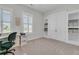 Bright office space with built-in shelving, a desk, and plenty of storage at 110 Bloomfield St, Summerville, SC 29486