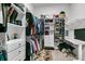 Spacious walk-in closet featuring custom shelving, hanging rods, and a built-in desk at 110 Bloomfield St, Summerville, SC 29486