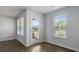 Sunroom with ample natural light, windows, and a glass door at 125 Mims Academy Dr, Harleyville, SC 29448