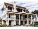 Stunning home featuring a covered patio, balconies, a chimney and a pool, creating an ideal outdoor living space at 13 Trumbo St, Charleston, SC 29401