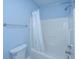 A full bathroom with shower/tub combo, white shower curtain, and handrail at 1319 Basildon Rd, Mount Pleasant, SC 29466
