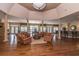 Open clubhouse features comfortable seating, hardwood floors, and a full bar for entertaining in the community at 1319 Basildon Rd, Mount Pleasant, SC 29466