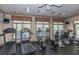 Bright and spacious gym featuring modern cardio equipment, ensuring a complete fitness experience for residents at 1319 Basildon Rd, Mount Pleasant, SC 29466