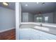 Bright kitchen featuring a breakfast bar, white cabinets, neutral countertops, and stainless steel appliances at 1319 Basildon Rd, Mount Pleasant, SC 29466