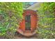 Unique barrel sauna surrounded by lush greenery offers a private and luxurious spa experience at 1350 Mosstree Rd, North Charleston, SC 29405