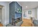 Stylish fireplace with brick surround adds warmth and character to the living space at 1350 Mosstree Rd, North Charleston, SC 29405