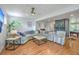 Spacious living room features hardwood floors, comfortable seating and open floor plan at 1350 Mosstree Rd, North Charleston, SC 29405