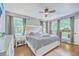 Spacious main bedroom features hardwood floors, and plenty of natural light at 1350 Mosstree Rd, North Charleston, SC 29405