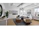 Serene main bedroom with natural light, a cozy seating area, and beautiful decor at 148 Falaise St, Charleston, SC 29492