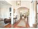 Bright entryway boasting hardwood floors, white trim, and an open concept to the living spaces at 158 Mary Ellen Dr, Charleston, SC 29403