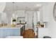 Spacious kitchen with white cabinetry, marble countertops, and stainless steel appliances at 158 Mary Ellen Dr, Charleston, SC 29403