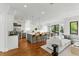 Open floor plan features the living room and kitchen with island and seating at 158 Mary Ellen Dr, Charleston, SC 29403