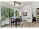 Dining area with natural light, adjacent laundry, and charming houseplants at 202 Pamela Ln, Summerville, SC 29483