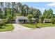 Well-maintained home with brick exterior, manicured lawn, and inviting curb appeal, nestled in a serene neighborhood at 202 Pamela Ln, Summerville, SC 29483