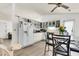 Bright kitchen with white cabinets, modern appliances, and a cozy dining area perfect for Gathering meals at 202 Pamela Ln, Summerville, SC 29483