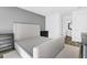 This bedroom features a gray accent wall and a doorway that reveals another room at 202 Waterwood Dr, Goose Creek, SC 29445