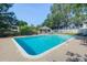 Sparkling community pool with ample seating and covered area at 202 Waterwood Dr, Goose Creek, SC 29445