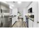 Modern kitchen with stainless steel appliances and stylish black countertops at 202 Waterwood Dr, Goose Creek, SC 29445