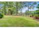 View of the backyard featuring a manicured lawn with views of the golf course at 204 Bellerive Ln, Summerville, SC 29483