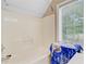 Bright bathroom showcasing a shower and a window with natural light at 204 Bellerive Ln, Summerville, SC 29483