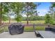 Enjoy golf course views from the comfort of this backyard deck with outdoor furniture at 204 Bellerive Ln, Summerville, SC 29483