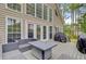 Relax on this beautiful deck with outdoor seating and a grill, perfect for entertaining at 204 Bellerive Ln, Summerville, SC 29483