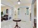 Grand foyer with marble flooring, a decorative table, and stained-glass windows at 204 Bellerive Ln, Summerville, SC 29483