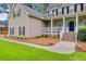 Inviting front entrance with a covered porch, stylish decor, and a charming ambiance at 204 Bellerive Ln, Summerville, SC 29483