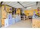 Clean and organized garage featuring shelving for tools and storage at 204 Bellerive Ln, Summerville, SC 29483