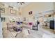 Expansive living room showing a large sofa, coffee table, and seamless transition to other areas at 204 Bellerive Ln, Summerville, SC 29483
