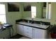 Bathroom showcasing a double vanity with framed mirror at 204 Pete Ewers Dr, Summerville, SC 29483