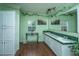 A well-lit bathroom with a double sink vanity and a window at 204 Pete Ewers Dr, Summerville, SC 29483