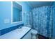 Bathroom with blue decor and a decorative shower curtain at 204 Pete Ewers Dr, Summerville, SC 29483