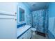 Bright bathroom with a shower and vanity and blue trim at 204 Pete Ewers Dr, Summerville, SC 29483