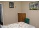 Simple bedroom with a dresser, and neutral tones that create a peaceful and uncluttered living space at 204 Pete Ewers Dr, Summerville, SC 29483