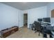 Bedroom with desk, antique cabinet, and tan carpet at 204 Pete Ewers Dr, Summerville, SC 29483