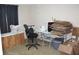 Versatile room features a sewing setup and ample storage, ideal for hobbies, crafts, or extra workspace at 204 Pete Ewers Dr, Summerville, SC 29483