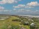 Stunning aerial view showcasing the coastline and diverse real estate options near the marshland and ocean at 209 Jungle Rd, Edisto Beach, SC 29438