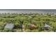 Breathtaking aerial view showcasing the neighborhood's lush greenery, coastal proximity, and serene ocean backdrop at 209 Jungle Rd, Edisto Beach, SC 29438